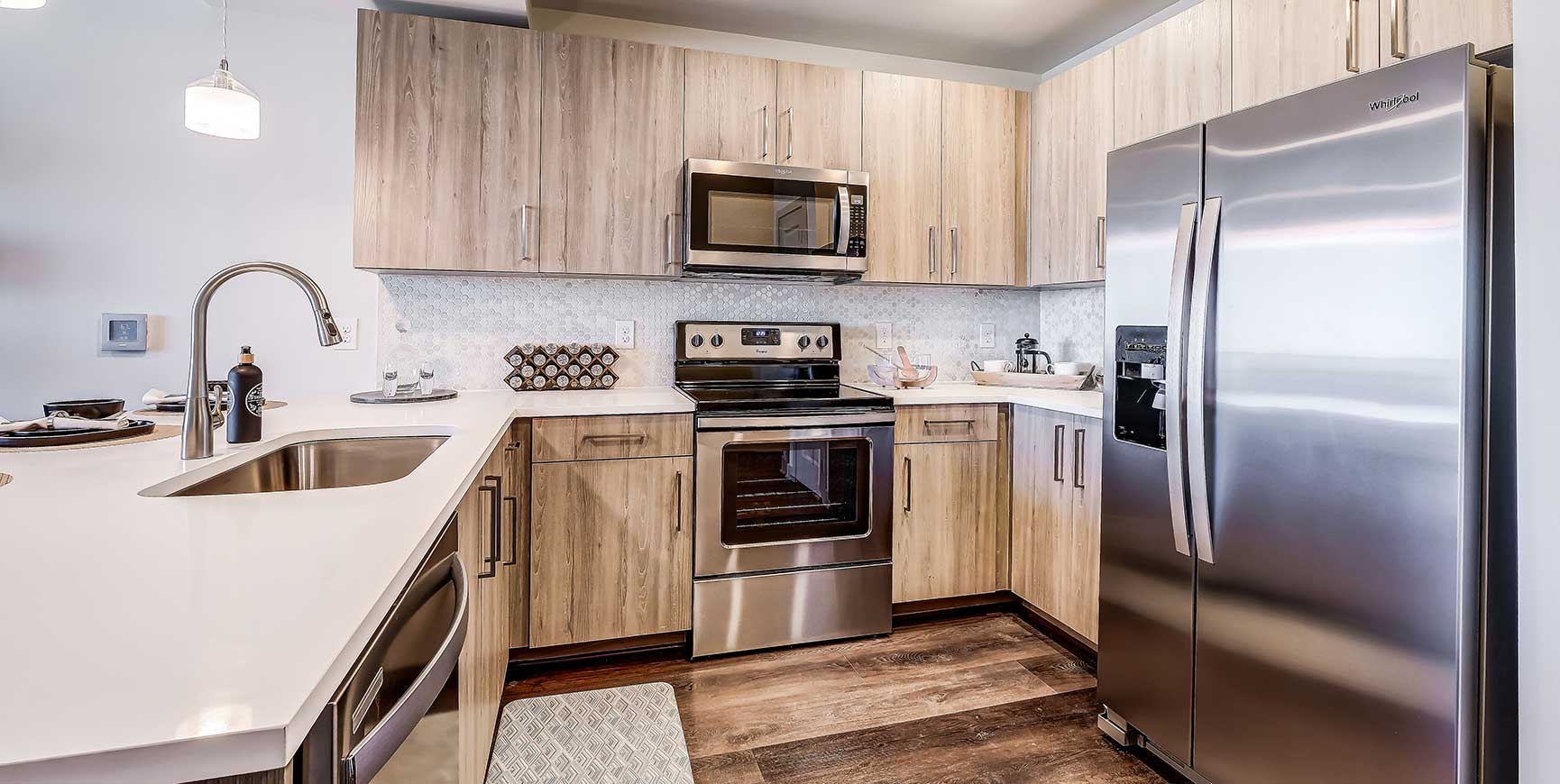 One bedroom kitchen with stainless steel Whirlpool appliances