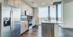 Luxe one bedroom apartment kitchen with soft close cabinetry